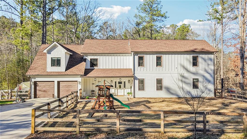 744 Narroway Trail Dallas, GA 30132 - Photo 53 of 59 front view of a house with a bench