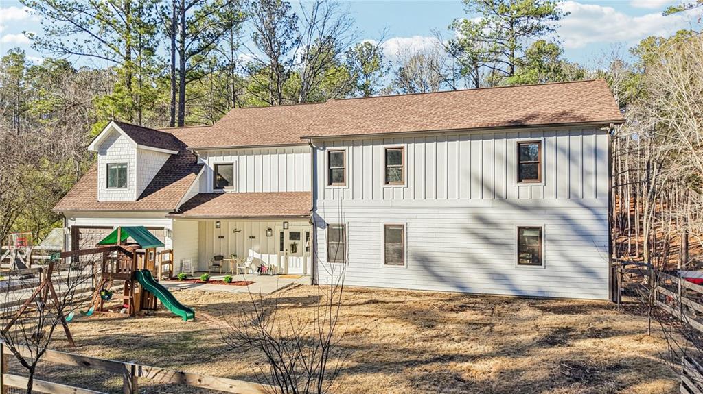 744 Narroway Trail Dallas, GA 30132 - Photo 54 of 59 a view of a white house with a sink and yard