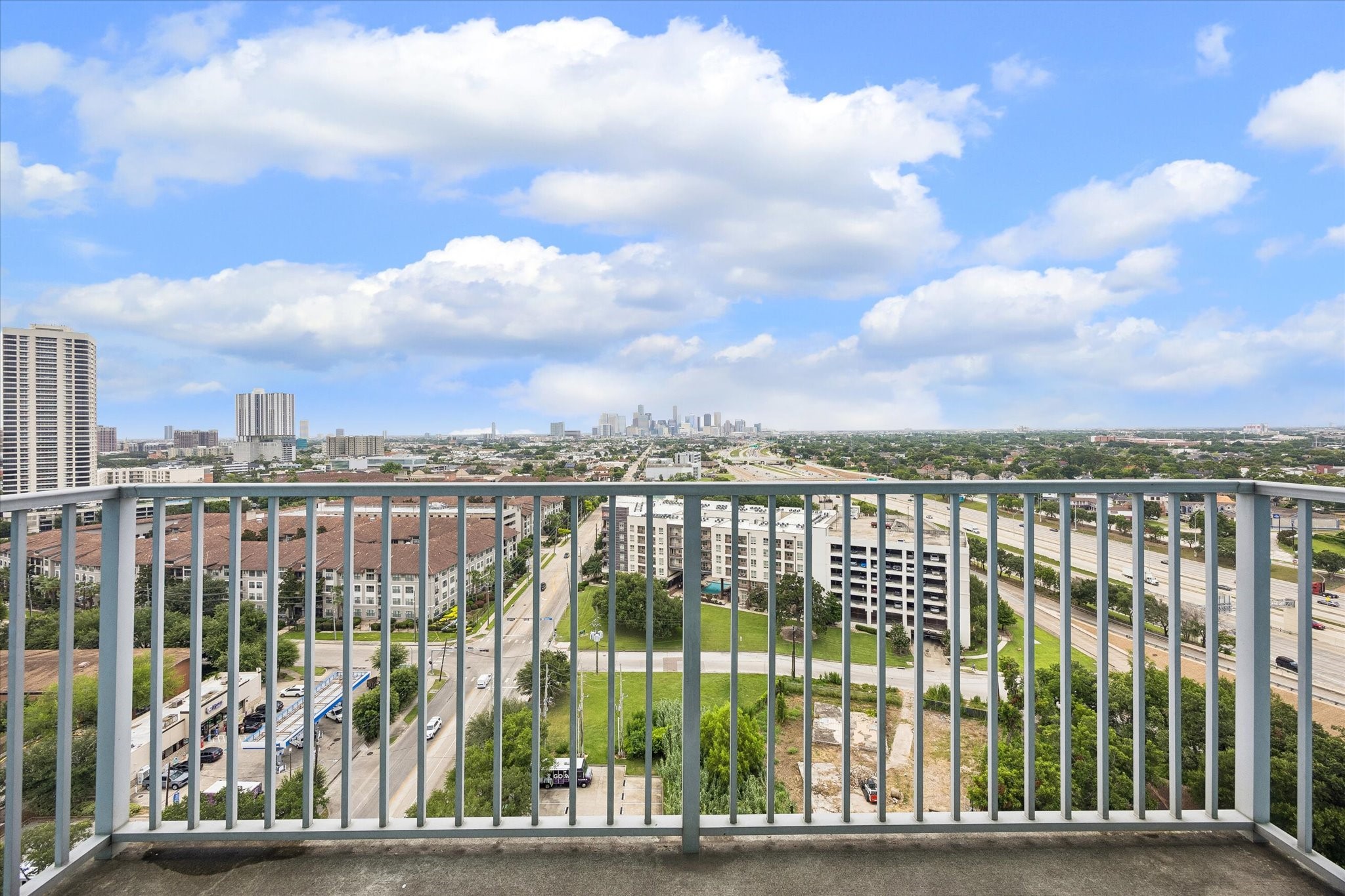 5925 Almeda Road, Unit 11615 Houston, TX 77004 - Photo 3 of 23 Enjoy the view everyday on your private balcony with downtown and park views