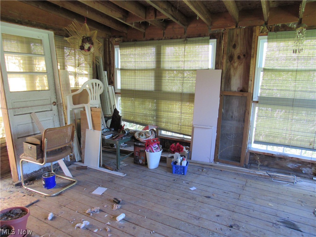 7301 South Ridge Road Madison, OH 44057 - Photo 16 of 26 Enclosed patio southern view