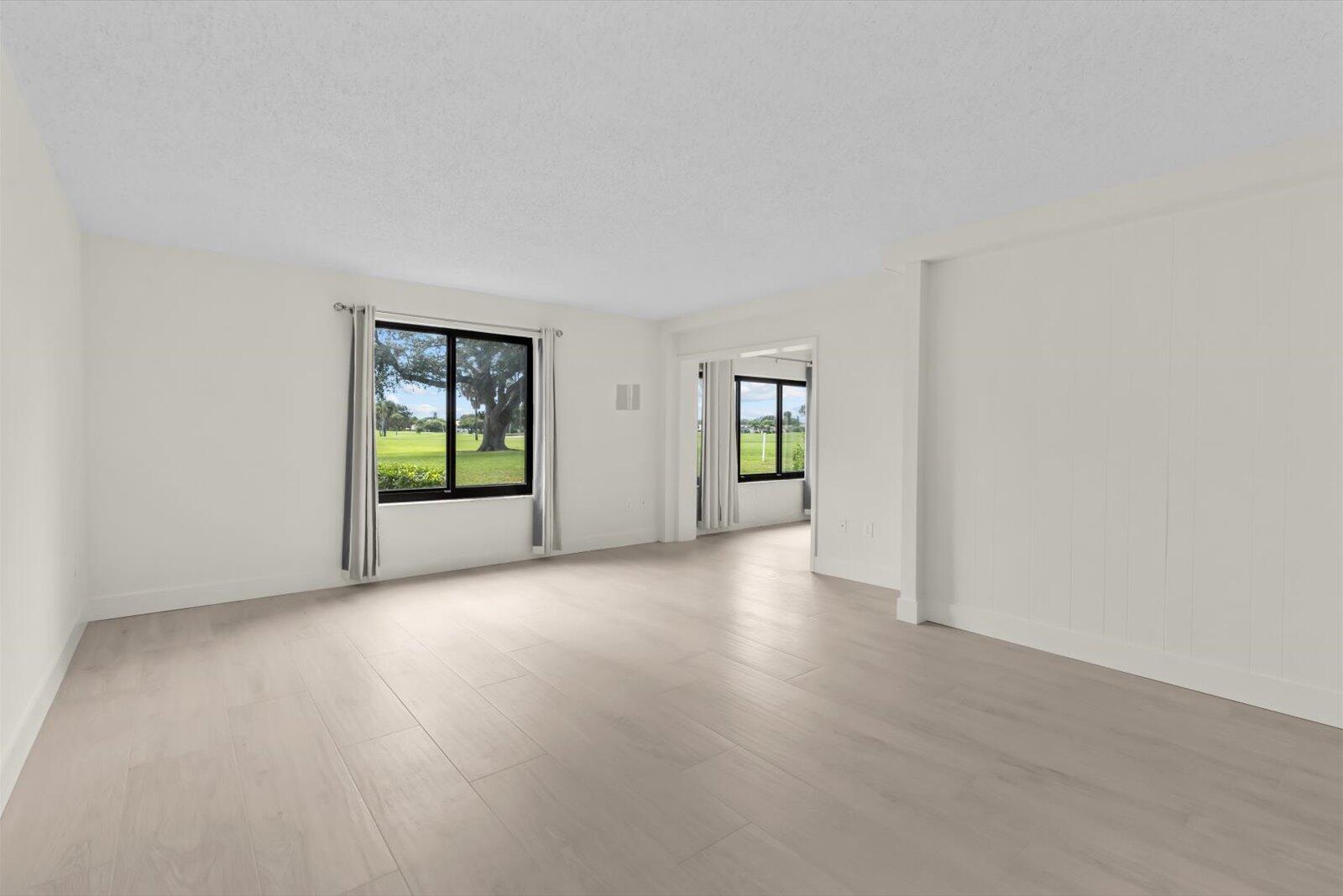 5413 Southeast Miles Grant Road, Unit G104 Stuart, FL 34997 - Photo 13 of 38 Living/Dining
