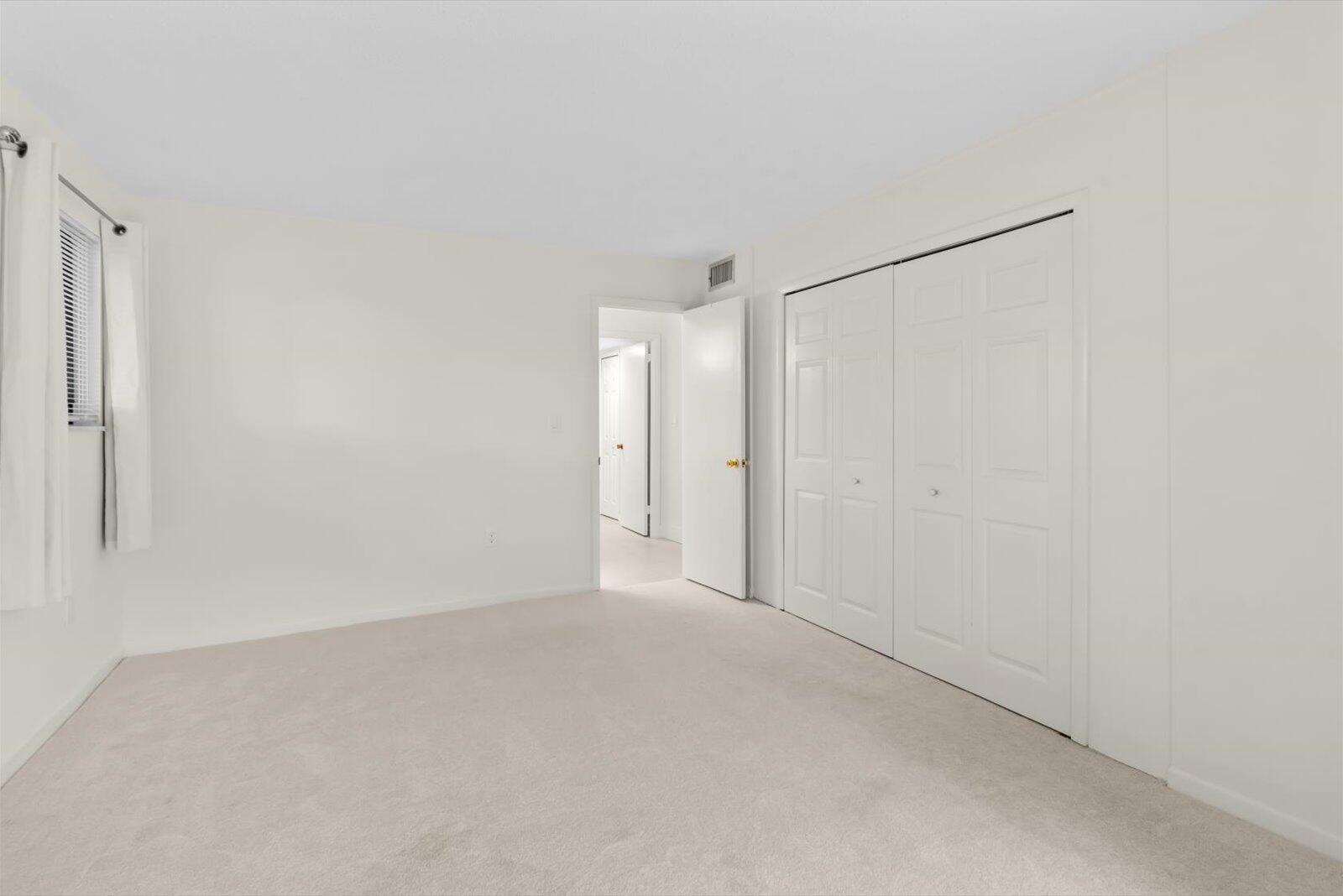 5413 Southeast Miles Grant Road, Unit G104 Stuart, FL 34997 - Photo 15 of 38 Bedroom