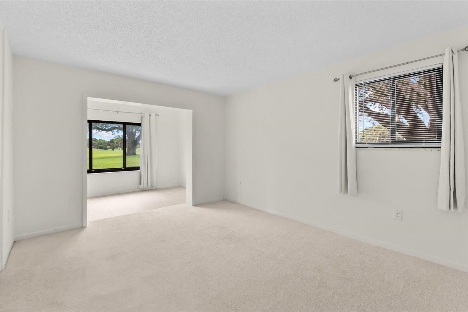 5413 Southeast Miles Grant Road, Unit G104 Stuart, FL 34997 - Photo 17 of 38 Bedroom