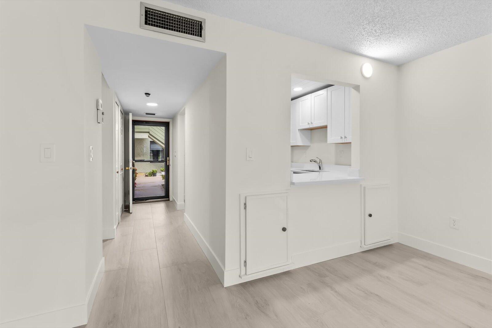 5413 Southeast Miles Grant Road, Unit G104 Stuart, FL 34997 - Photo 10 of 38 Entry
