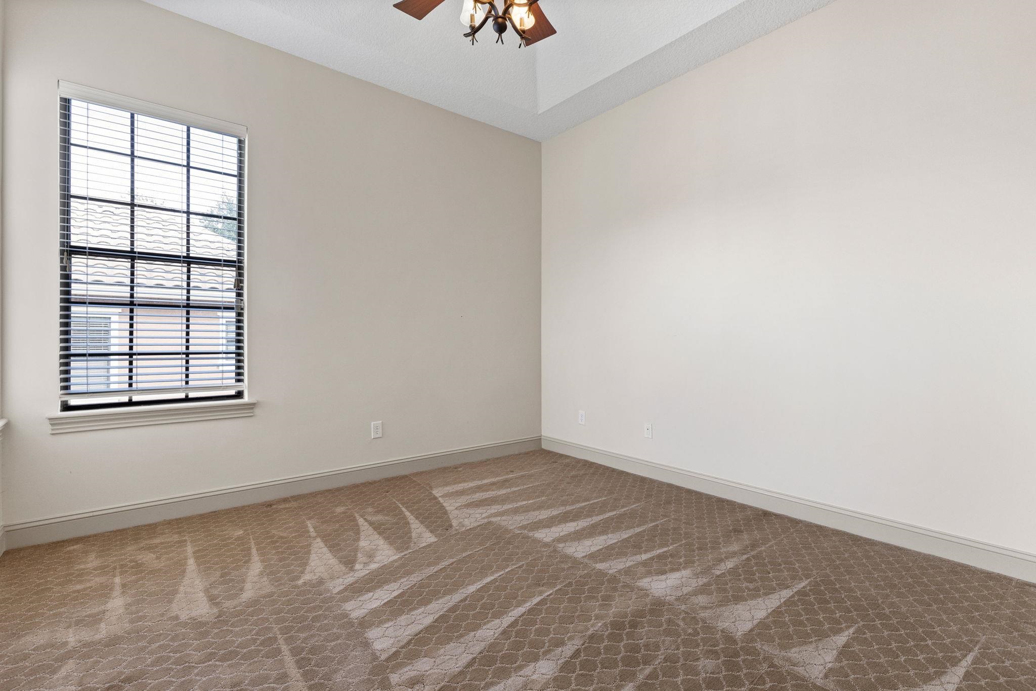 650 South Loop Street St. Augustine, FL 32095 - Photo 19 of 40 an empty room with windows