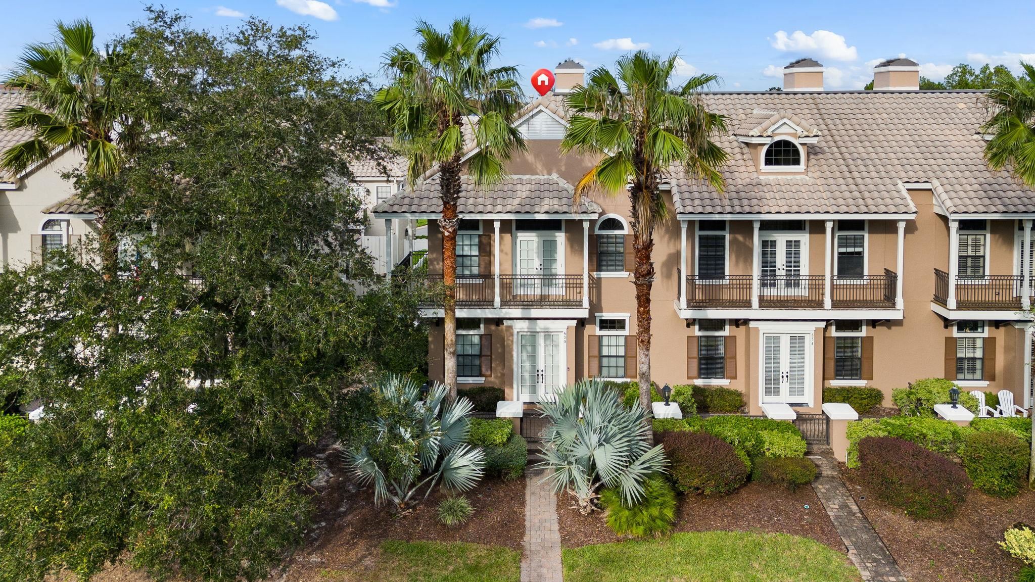 650 South Loop Street St. Augustine, FL 32095 - Photo 4 of 40 a front view of a house with a yard