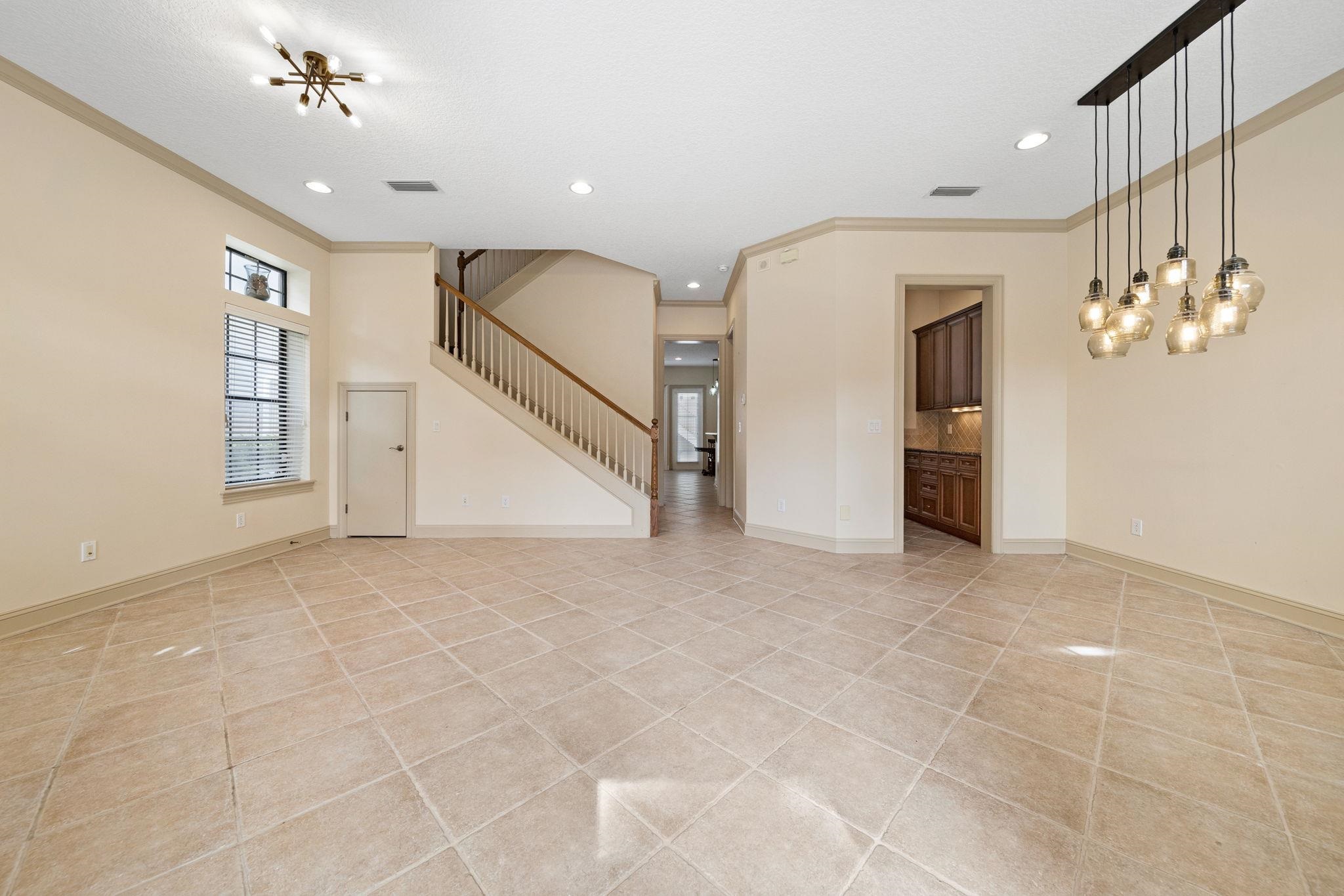 650 South Loop Street St. Augustine, FL 32095 - Photo 10 of 40 a view of a hallway with chandelier