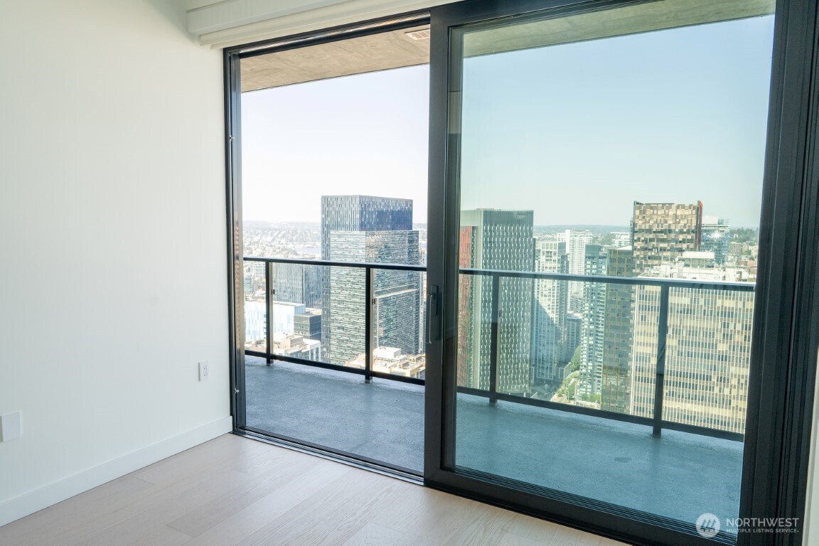 300 Virginia Street, Unit 4403 Seattle, WA 98101 - Photo 14 of 40 a view of a glass door with a window