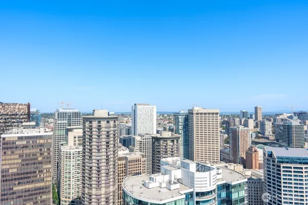 a view of a city with tall buildings