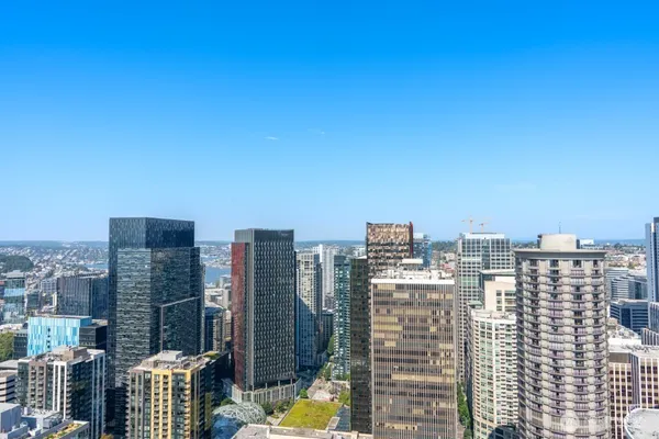 a view of a city with tall buildings