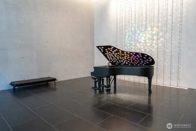 a view of a livingroom with furniture and a potted plant