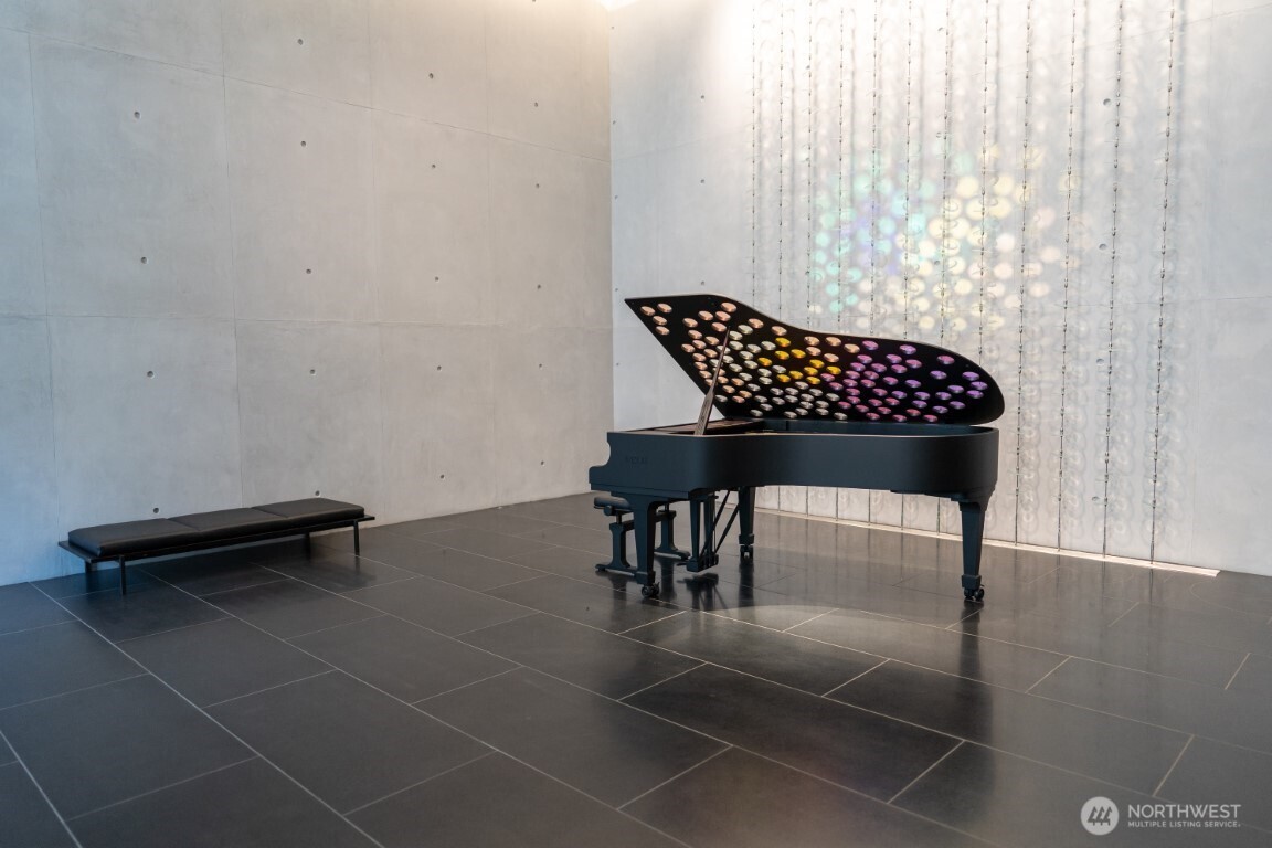 300 Virginia Street, Unit 4403 Seattle, WA 98101 - Photo 2 of 40 a view of a livingroom with furniture and a potted plant