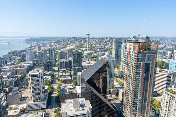 a view of a city with tall buildings