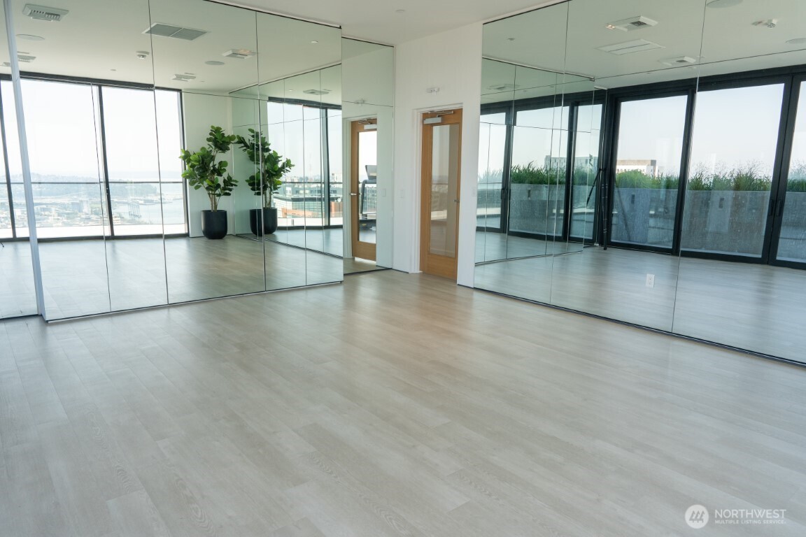 300 Virginia Street, Unit 4403 Seattle, WA 98101 - Photo 36 of 40 a view of an entryway with wooden floor