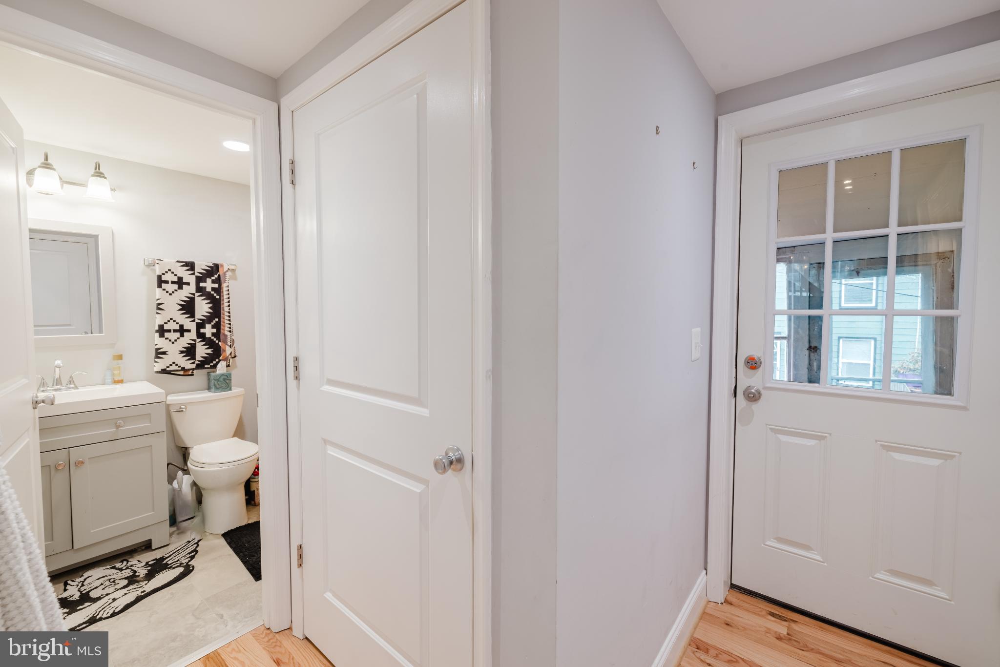 3804 Falls Road Baltimore, MD 21211 - Photo 10 of 23 Hallway to main level full bath with a tub shower