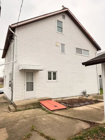 a view of a house with a garage