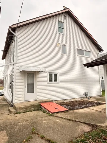 a view of a house with a garage