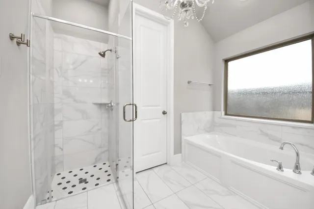 a bathroom with a double vanity sink and mirror