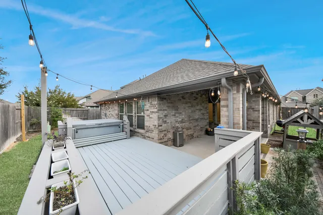 a view of backyard with seating space