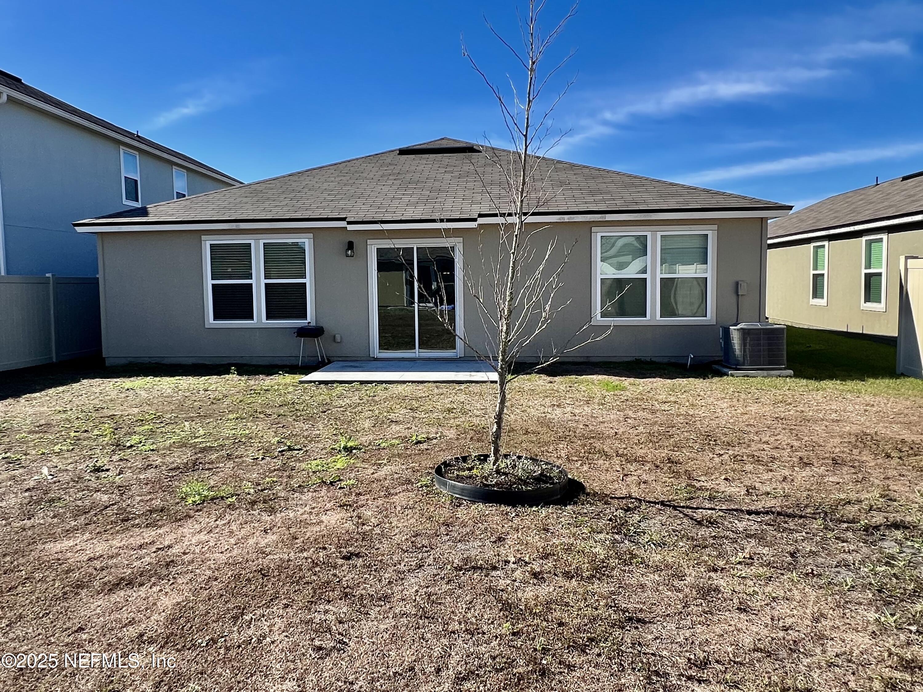 12659 European Beech Road Jacksonville, FL 32218 - Photo 21 of 30 a front view of a house with a yard