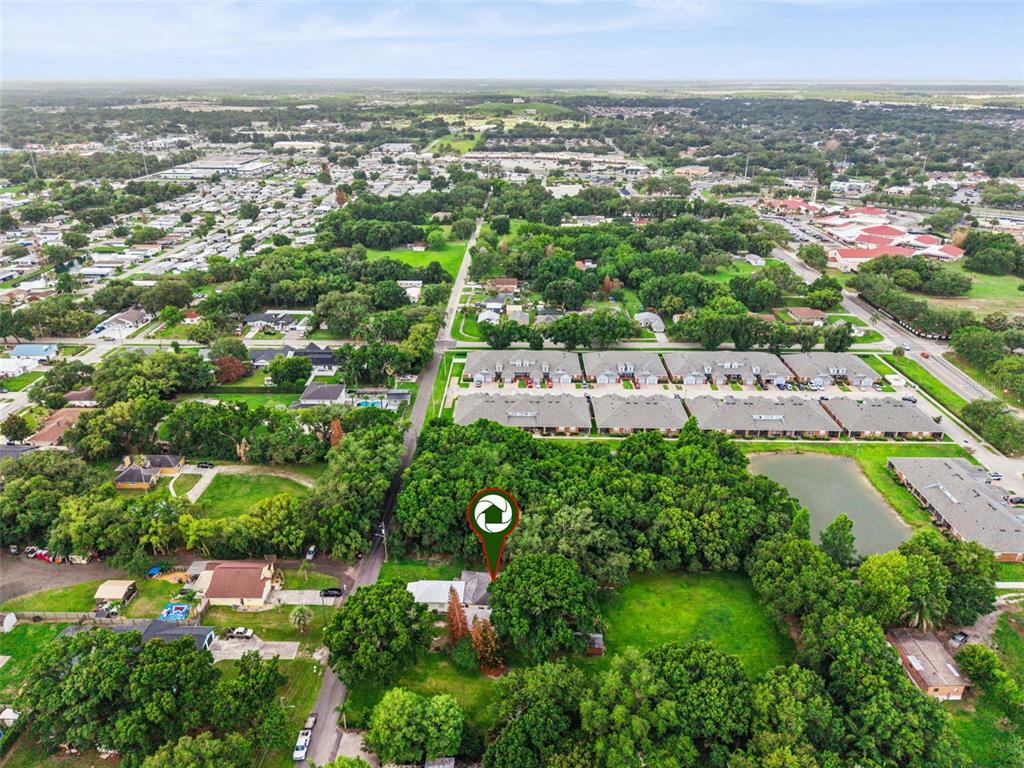 420 Jacks Memorial Road St. Cloud, FL 34769 - Photo 24 of 31 an aerial view of multiple house