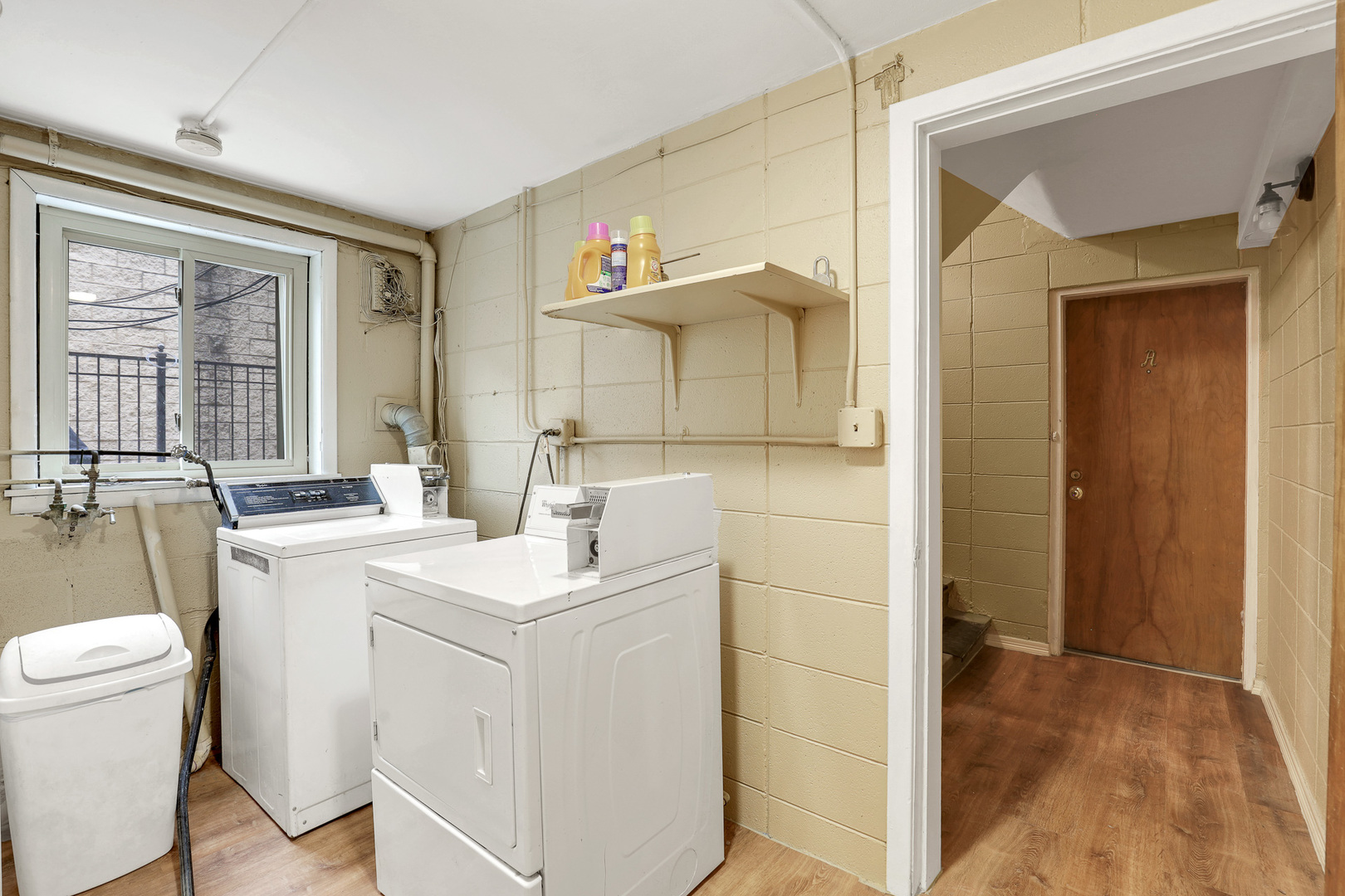 3725 North Harlem Avenue, Unit F Chicago, IL 60634 - Photo 15 of 15 a view of bathroom with a sink and a toilet