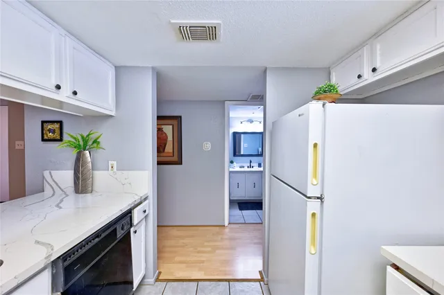 a bathroom with a bathtub and a sink