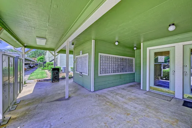 a view of swimming pool with a patio