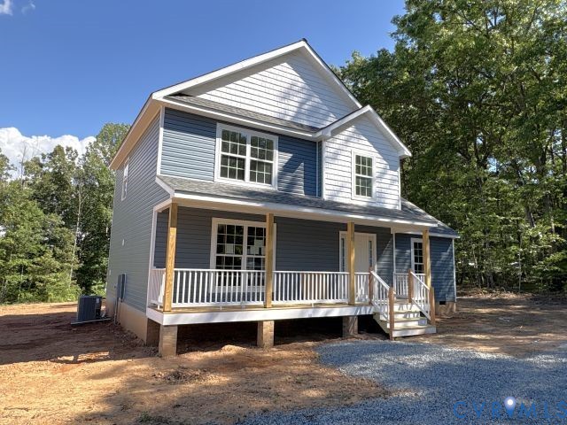 2570 Doctors Road Louisa, VA 23093 - Photo 1 of 14 a front view of a house with a yard
