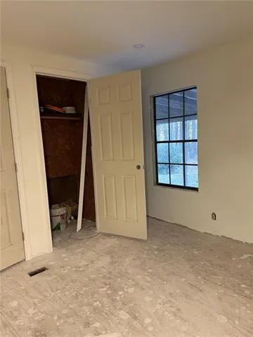 an empty room with closet
