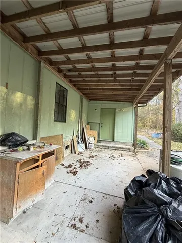 a kitchen with a stove and a refrigerator