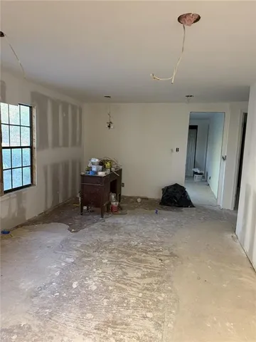 a view of a room with a window