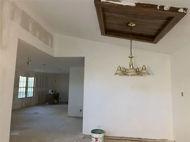 a view of empty room with windows