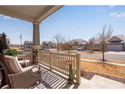 a view of balcony with chairs