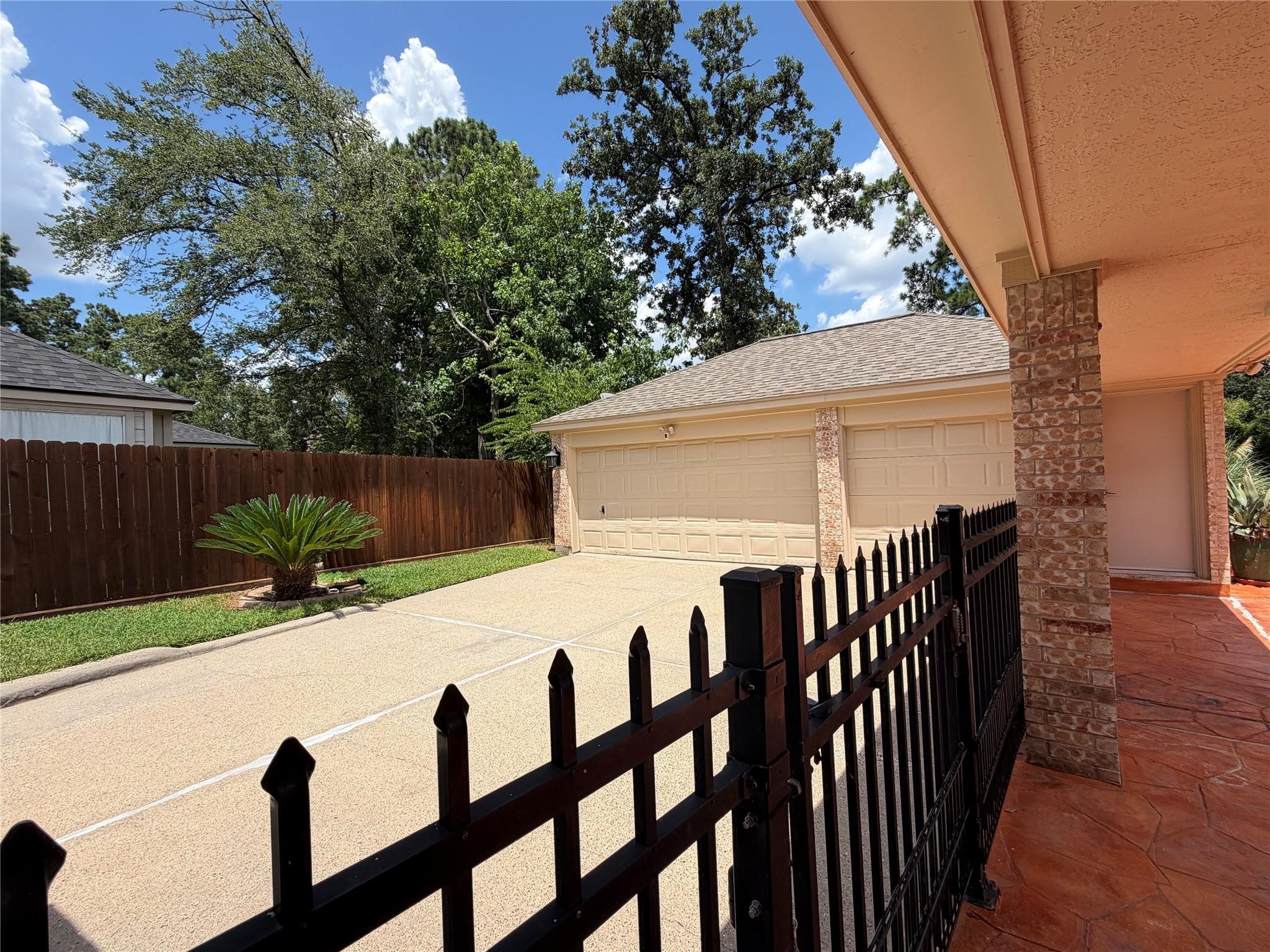 24818 Haverford Road Spring, TX 77389 - Photo 42 of 45 View of garage from back covered patio
