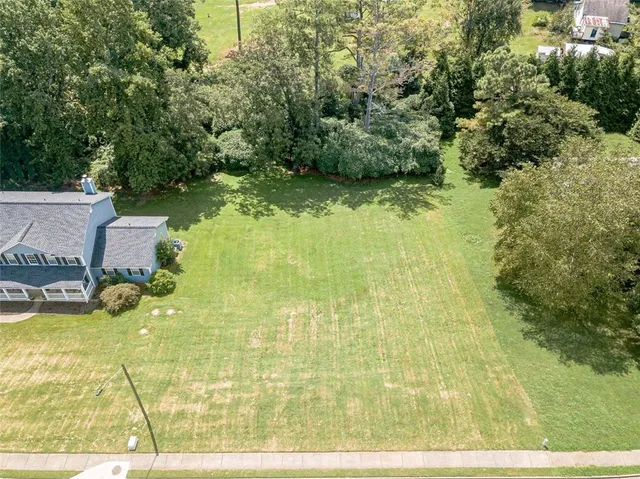 a view of swimming pool from a lake view