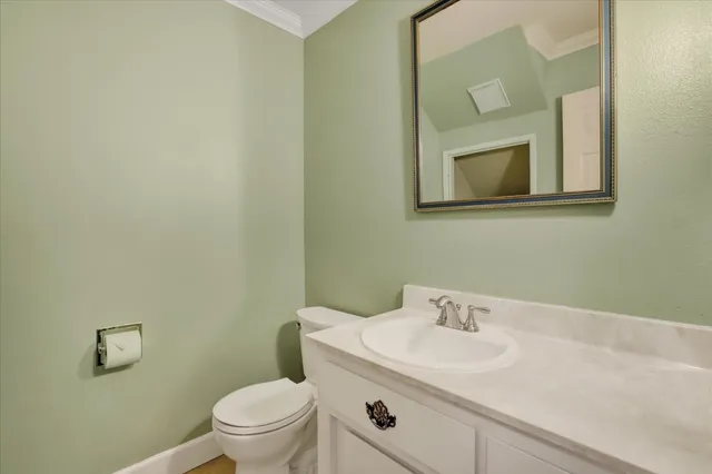 a bathroom with a sink double vanity and a mirror