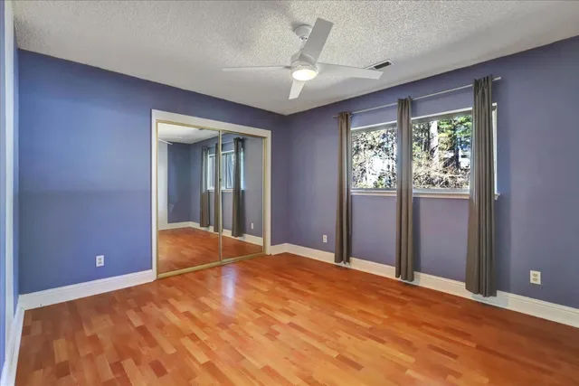 a bathroom with a sink double vanity and a mirror