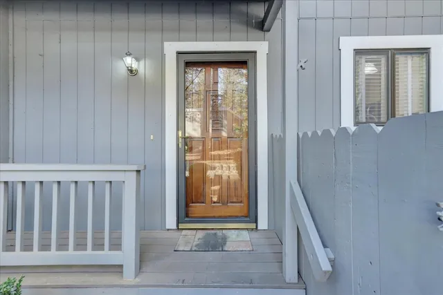 a kitchen with granite countertop a sink and steel appliances