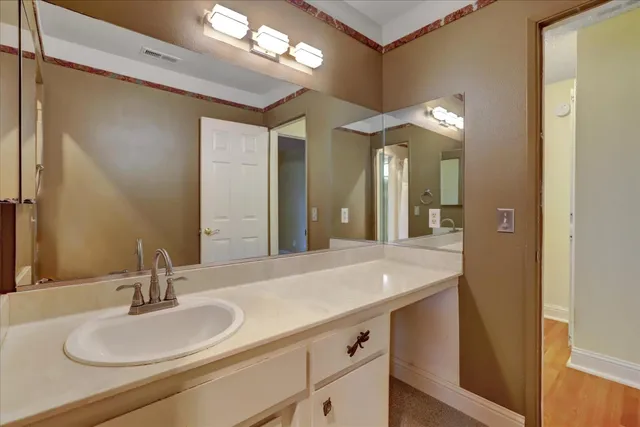 a view of swimming pool from a balcony