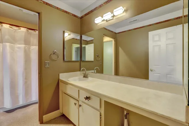 a view of a chairs and table in a yard