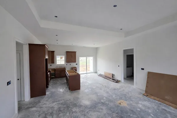 a view of a livingroom with furniture and window
