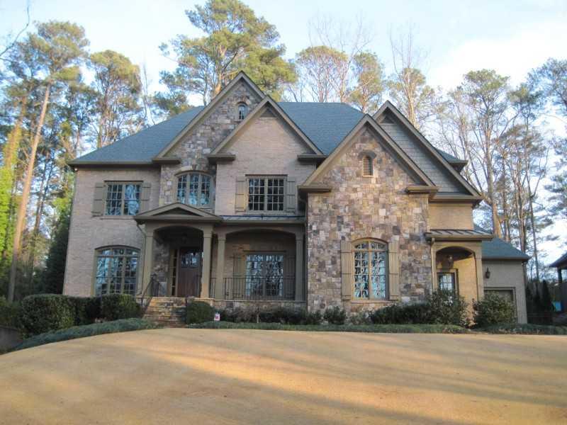 4117 Rickenbacker Drive Northeast Atlanta, GA 30342 - Photo 1 of 1 Exterior Front. This handsome brick and stone house, built by John Willis, sits on a gently sloping lot overlooking the Blue Heron Nature Preserve.