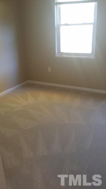 2604 Sanderford Road Raleigh, NC 27610 - Photo 12 of 22 an empty room with a window