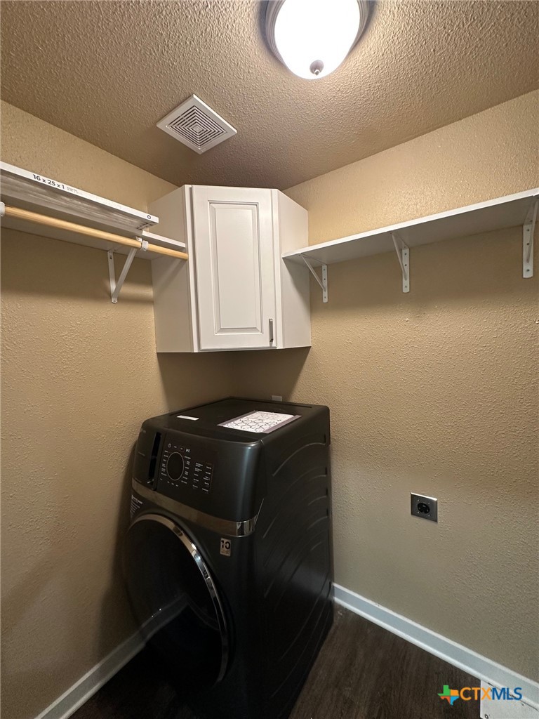 952 Fannin Loop Temple, TX 76501 - Photo 10 of 17 a utility room with dryer and washer