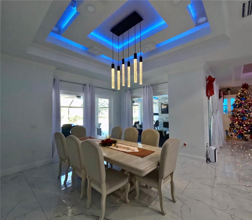 10112 Judy Road Dover, FL 33527 - Photo 15 of 49 a view of a dining room with furniture and window