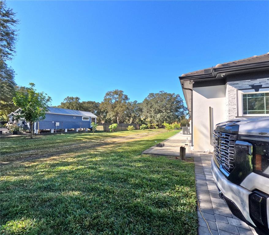 10112 Judy Road Dover, FL 33527 - Photo 3 of 49 a front view of house with yard