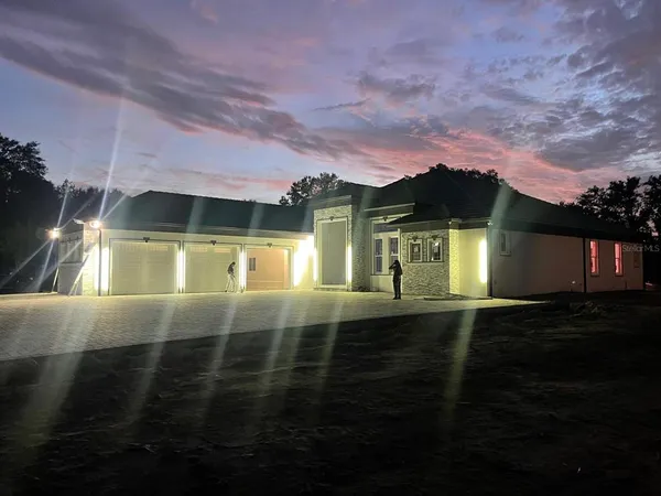 a view of an house with backyard space