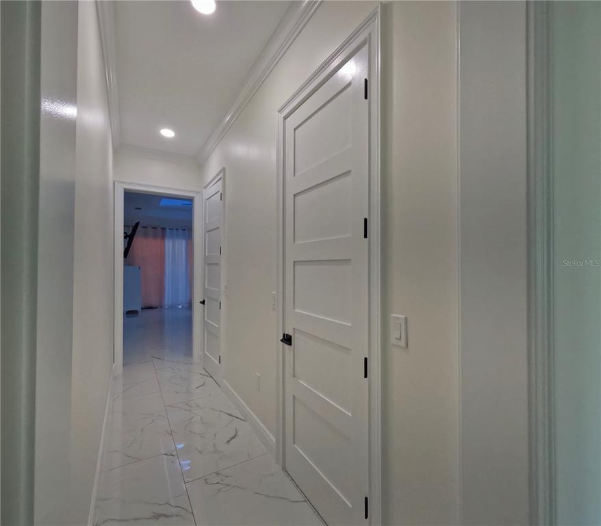 10112 Judy Road Dover, FL 33527 - Photo 31 of 50 a view of a hallway with closet and bathroom