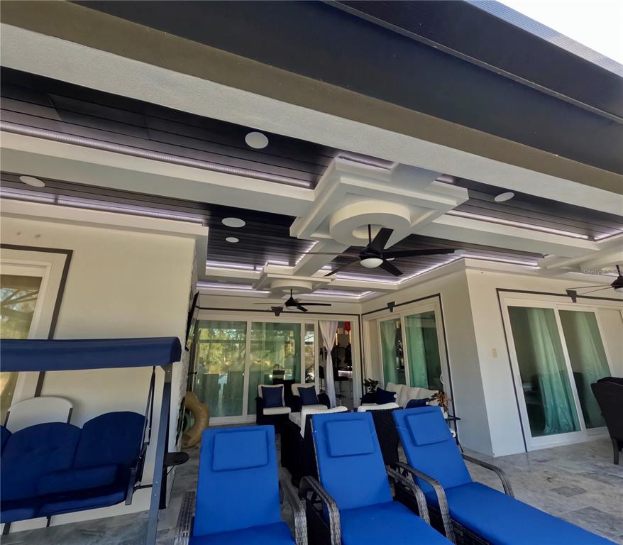 10112 Judy Road Dover, FL 33527 - Photo 40 of 49 a view of a dining room with furniture window and wooden floor